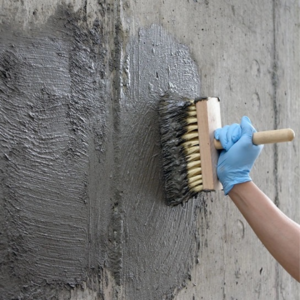 Using bentonite clay panels or sheets that expand upon contact with water, forming a watertight barrier.